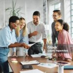 Business people having a meeting in the office. Teamwork and success concept